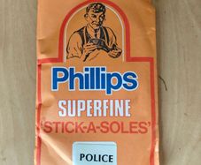 Phillips Superfine 'stick-a-soles' with 2 soles Police sticker cobbler shoe repairs advertising