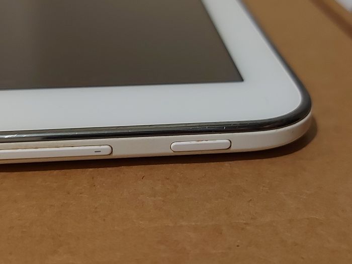 Samsung Galaxy Tab 4, Model SM-T530, 16GB, White, working great, in excellent condition and with a bunch of Family-children  movies