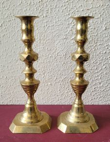 Antique diamond brass push candlesticks