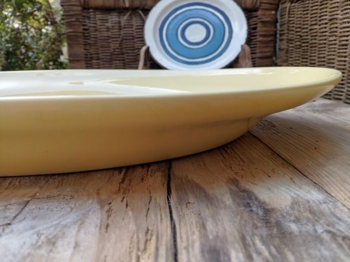 Yellow Swedish dish, yellow platter