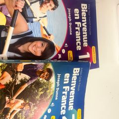 French books Bienvenue en France 1 and 2 and workbooks