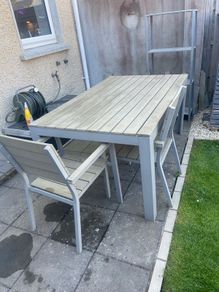 garden table and four chairs