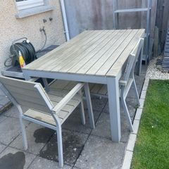 garden table and four chairs