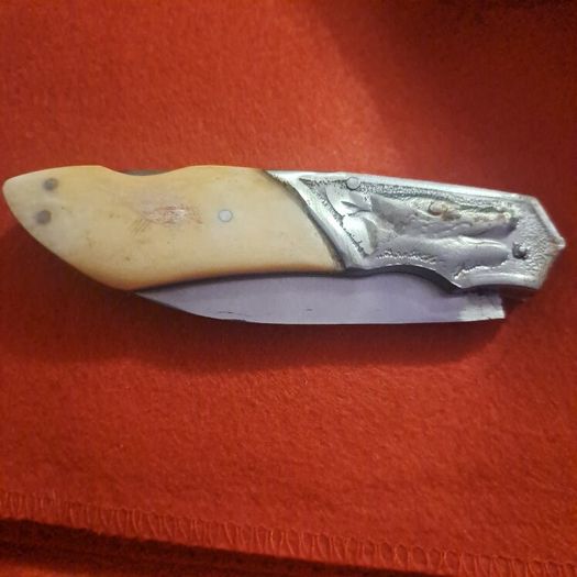 lock knife wolfhead decorative and bone handle