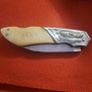 lock knife wolfhead decorative and bone handle Image 5