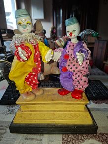 Rare Pair of Vintage Porcelain Head and Hands Circus Clowns mounted on a decorative base,