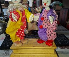 Rare Pair of Vintage Porcelain Head and Hands Circus Clowns mounted on a decorative base,