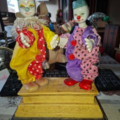 Rare Pair of Vintage Porcelain Head and Hands Circus Clowns mounted on a decorative base,