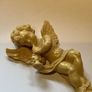 Vintage wall-mounted resin figurine of a cherub playing a trumpet Image 6
