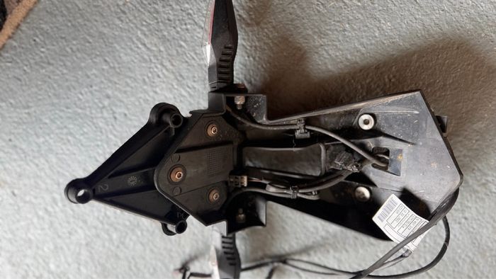 BMW S1000RR. Genuine License Plate Bracket/LED indicators.