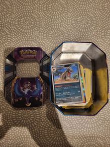 110 Pokemon Cards and Pokemon Tin