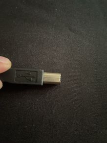 Standard USB-A to USB-B Cable (The "Printer Cable")