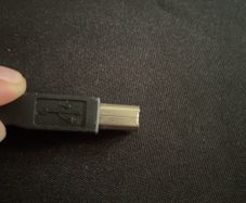 Standard USB-A to USB-B Cable (The "Printer Cable")
