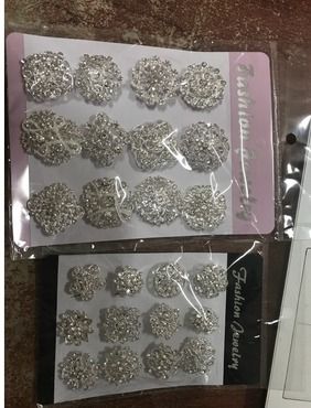 24 Silver Brooches