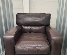 Brown leather armchair