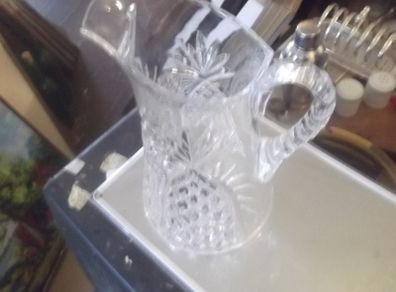 a cut glass water jug
