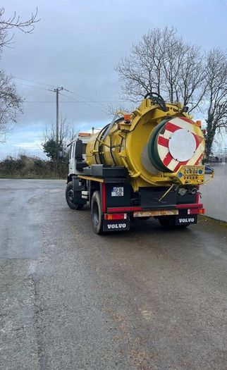 Volvo truck with whale vacuum tanker jetter