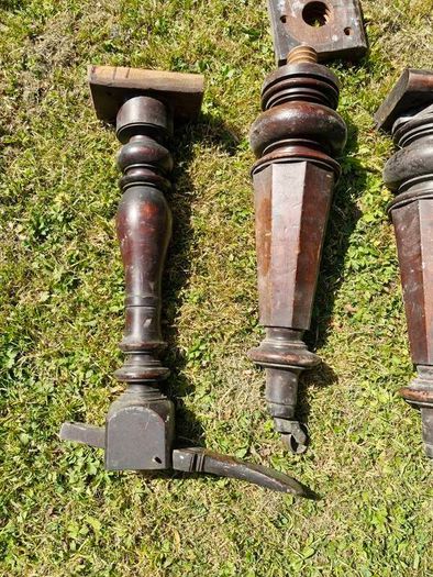 Antique mahogany piano legs with bronze casters
