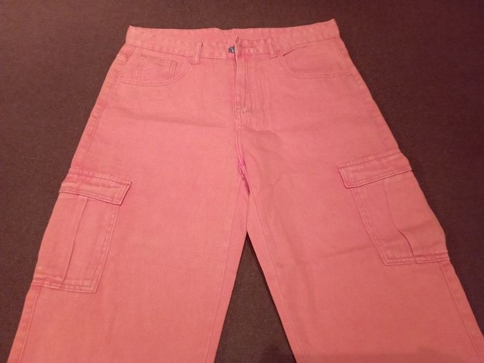 Orange cargo trousers.