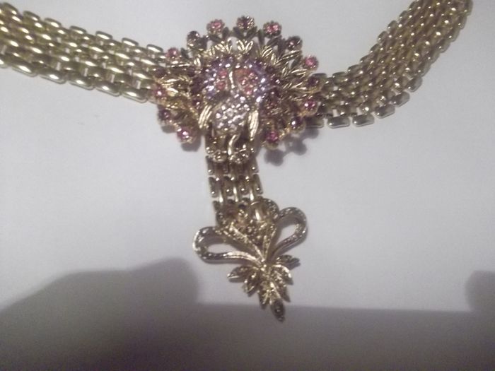 a vintage gold colour penden