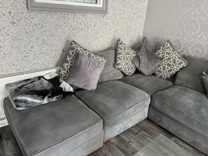 corner sofa and pouffe