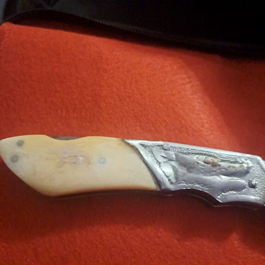lock knife wolfhead decorative and bone handle
