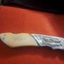 lock knife wolfhead decorative and bone handle Image 7
