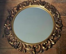 Vintage ornate gold mirror
