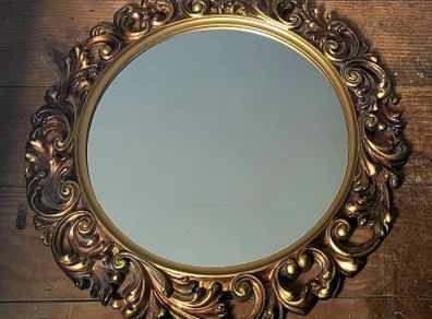 Vintage ornate gold mirror