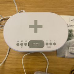 Alarm clock with wireless charging