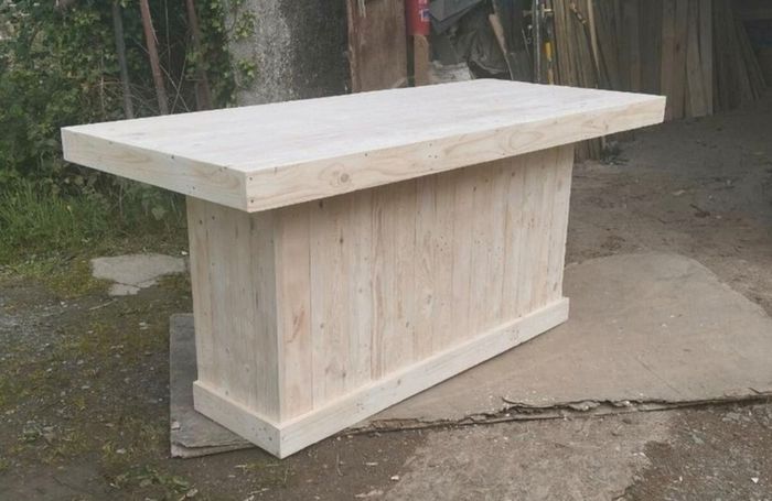 Rustic kitchen island with triple overhang