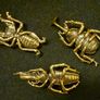 3 brass beetles. Image 2