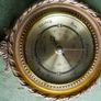 Vintage barometer with silvered dial mounted in an ornate gilt frame. Image 2