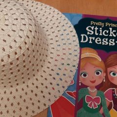 New childs hat tag attached and new sticker dress book