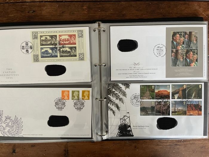 Collection of  87 UK First Day Cover stamps 2003 to 2006 in album