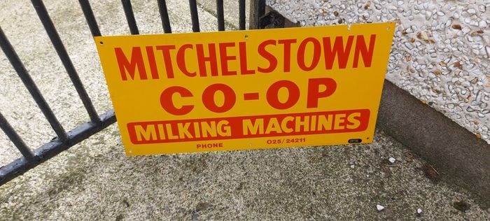 Mitchelstown hay barn advertising,sign by currans of Clonmel,,original ,came out of the offices in mitchelstown branch ,,,few marks  ,lovely advertising display item, for any garage ,man cave or personal collection, sold as is