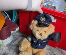 Pilot teddy bear in uniform