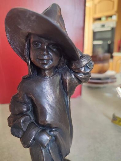 Genesis Sculpture Of A Small Girl Dressing Up With Her Moms Clothes