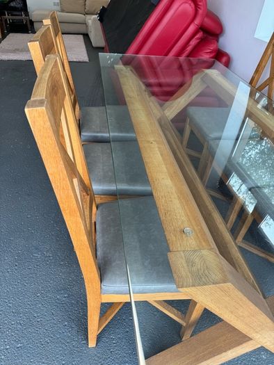 Glass dining room table with 6 chairs