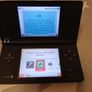 nintendo dsi black + 2 great games Image 5