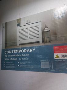 Radiator cover pre finished white slatted design.