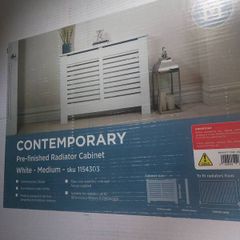 Radiator cover pre finished white slatted design.