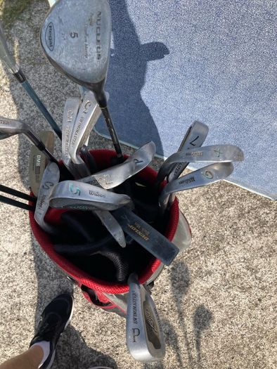 wilson bag and various clubs