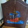 Dart Board In Cabinet Image 2
