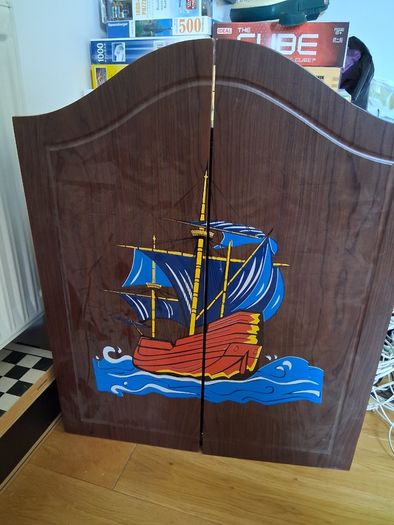 Dart Board In Cabinet