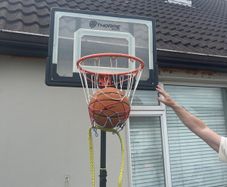Basketball hoop and stand with basketball