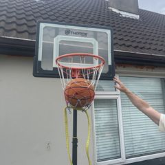 Basketball hoop and stand with basketball