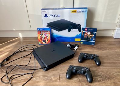 500 GB PlayStation 4 console bundle + 2 controllers + 2 games