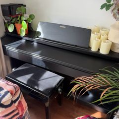 Electric piano Casio Celviano AP270 with adjustable stool