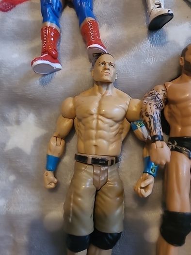 13 WWE wrestling figures